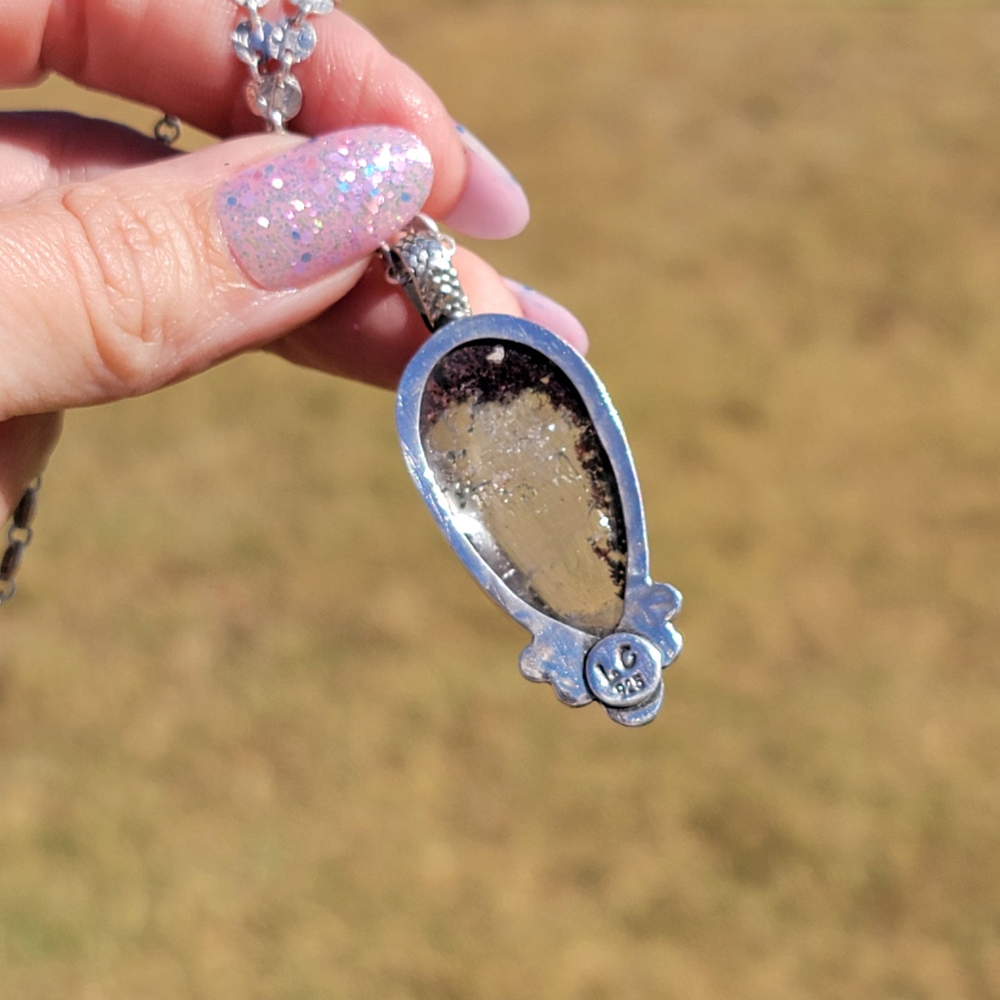 Included Quartz and Sterling Pendant