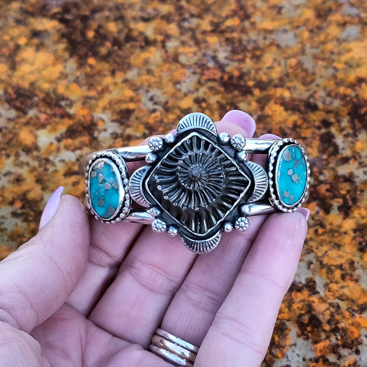 Ammonite Fossil Negative and Persian Turquoise with Stamped sterling details