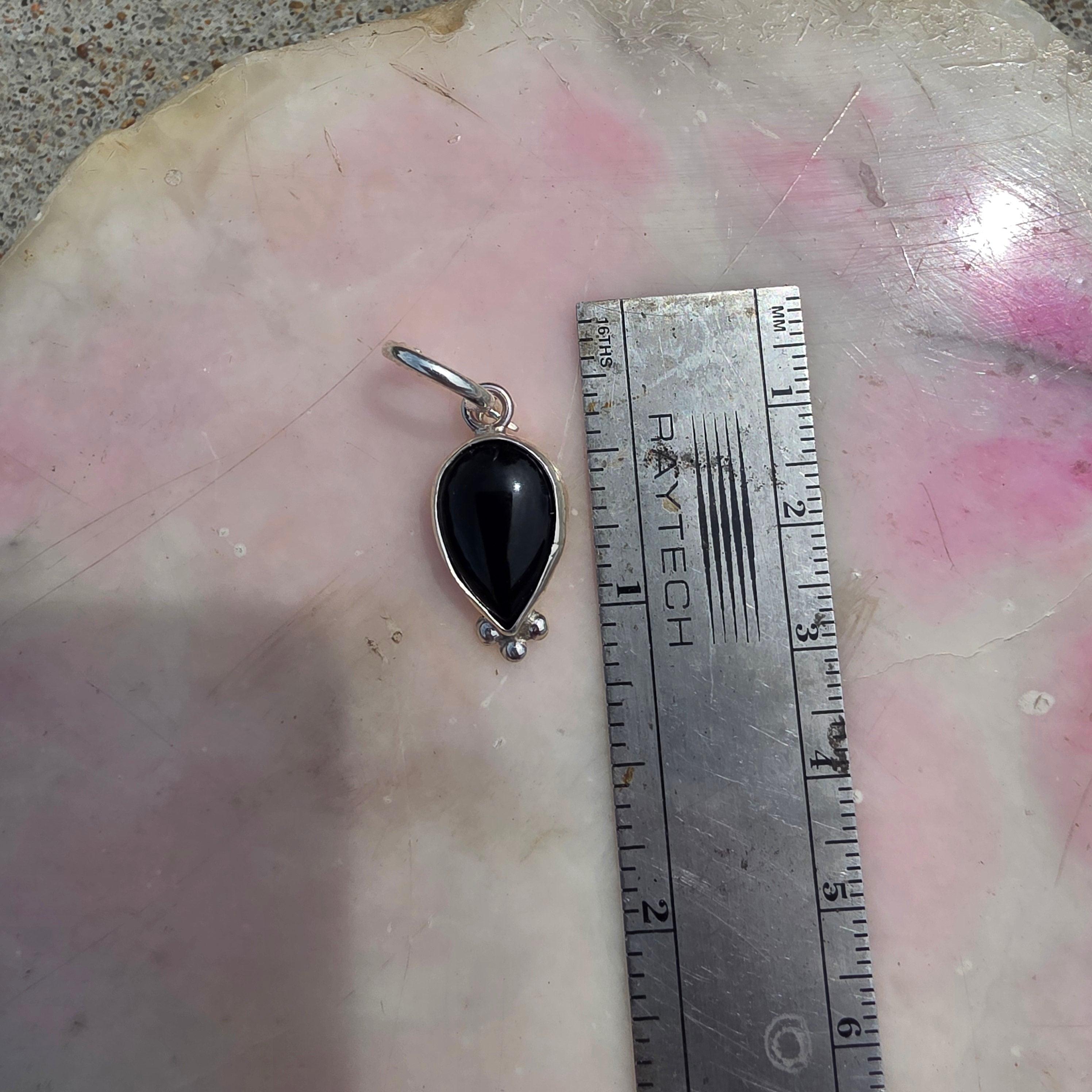 Onyx charm earrings with Bead details